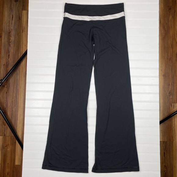 Lululemon What Goes Around Comes Around Flare Leggings Black Women’s Size 8 - Picture 1 of 5